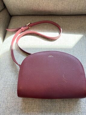A.P.C. Half Moon Crossbody Bag in Bordeaux Red